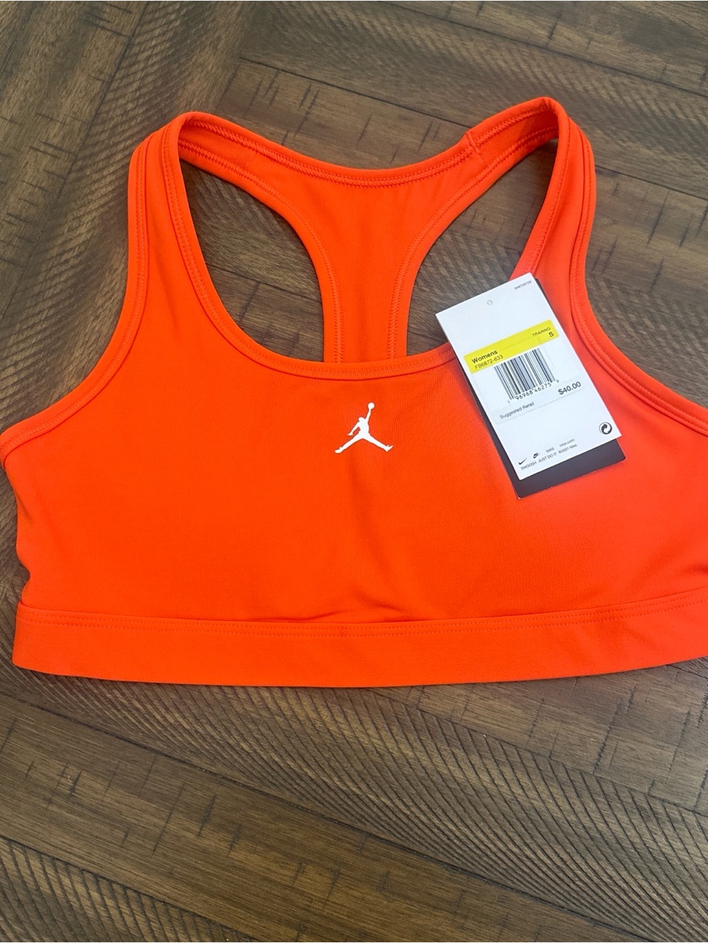Jordan Women's Bright Orange Racerback Sports Bra with Jumpman Logo